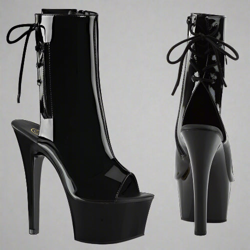 Black high-heeled platform boots with glossy finish on a white background