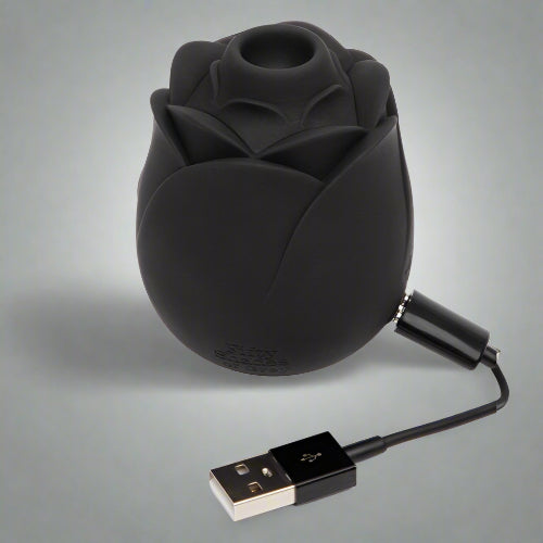 Fifty Shades of Grey 'Hearts & Flowers' in Corpus Christi Black rose-shaped device with a USB cable on a white background