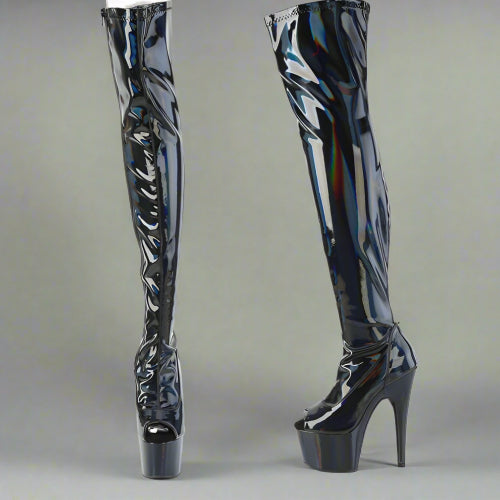 Black patent leather platform boots on a white background