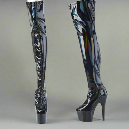 Black patent leather platform boots on a white background