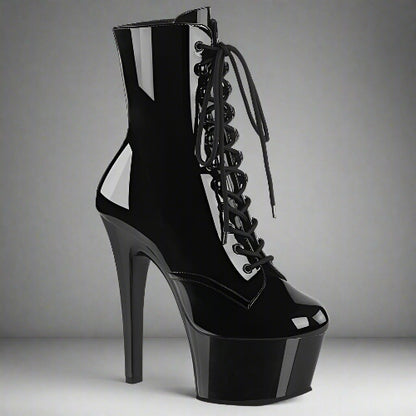 Black high-heeled platform boot with lace-up design on a white background
