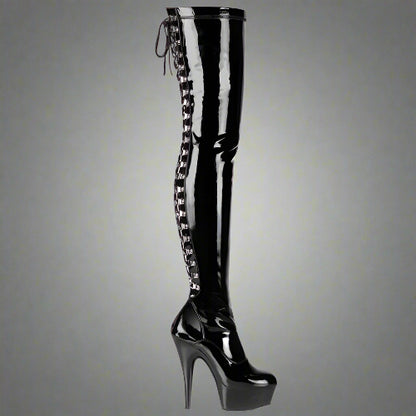 Black patent leather knee-high boot with high heel on a white background