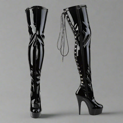 Black patent leather knee-high boots with decorative laces