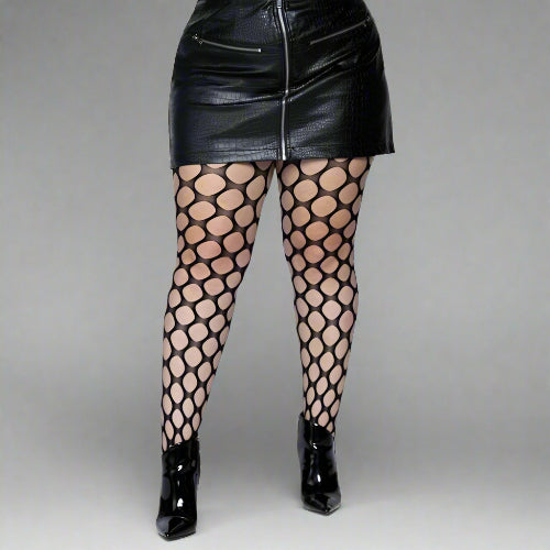 Black fishnet stockings with a white background